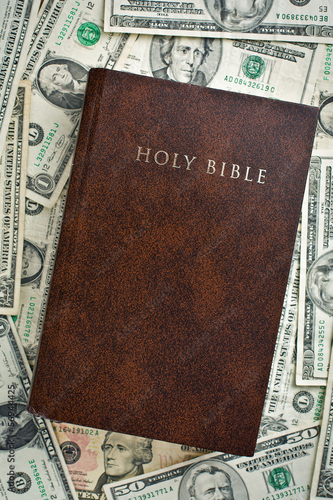 Naklejka premium holy bible on us dollars