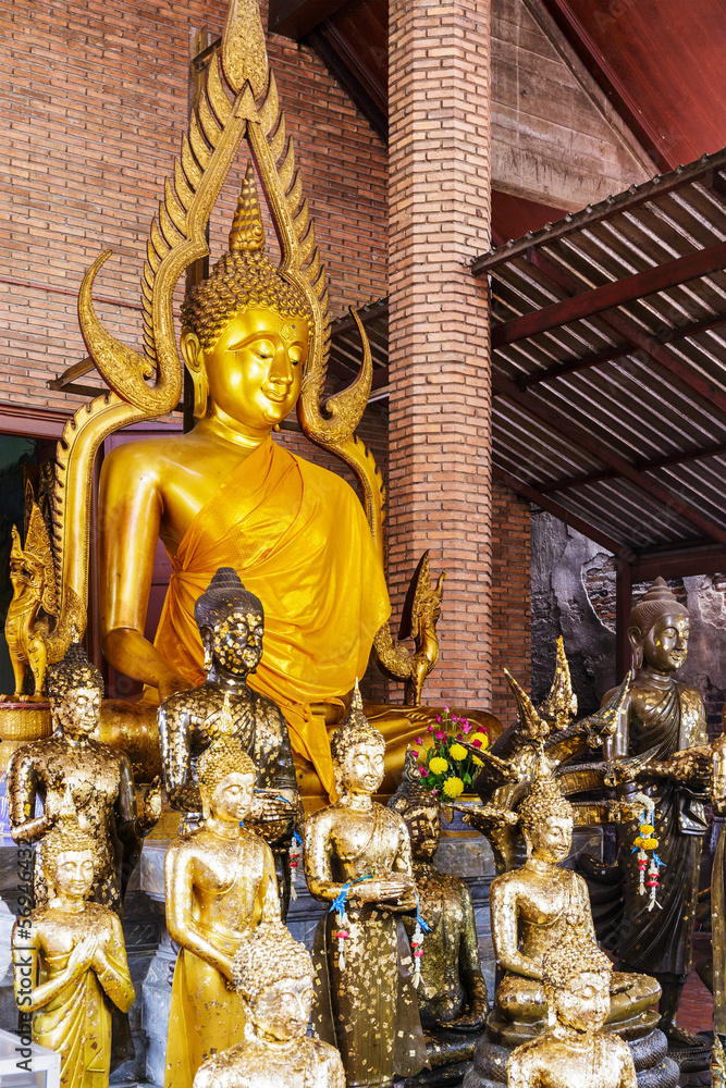 Golden foil on buddha statue in temple Golden foil on buddha statue in temple
