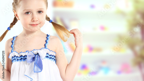young girl poses for a picture