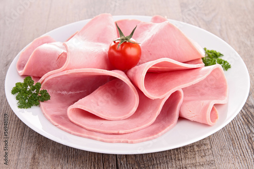 sliced pork ham with salad and tomato