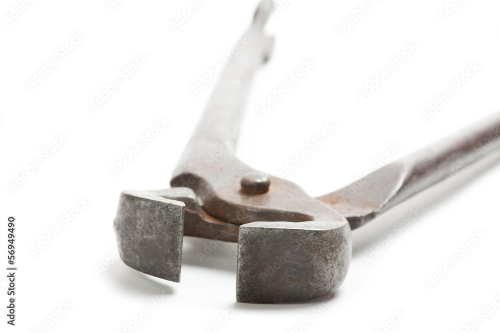 Old iron nippers isolated on white background Old iron nippers isolated on white background