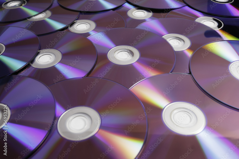 Background of some colorful compact discs Background of some colorful compact discs