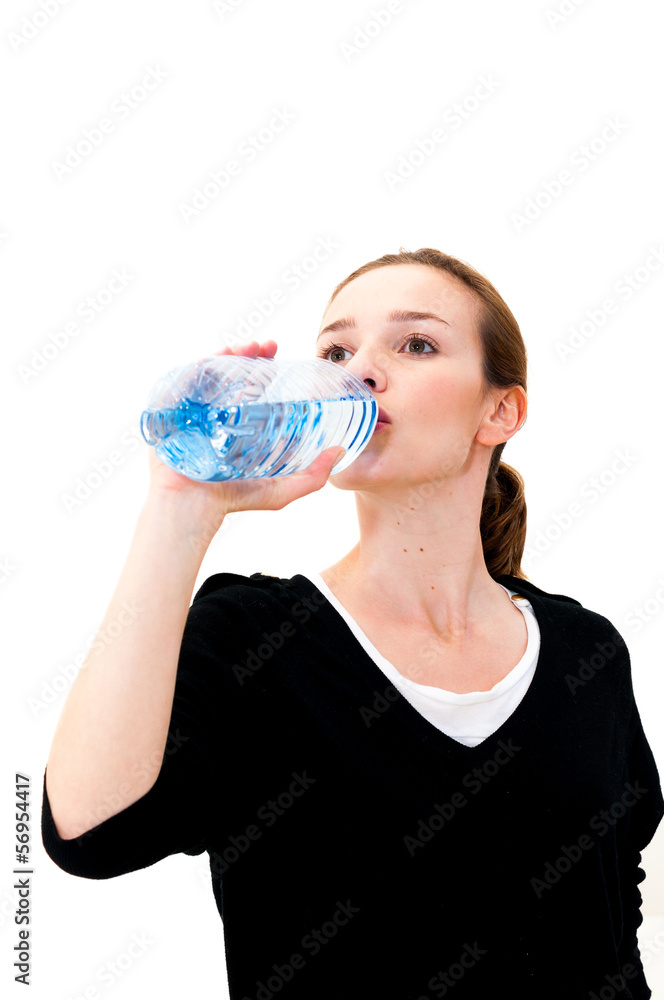 woman drinking water against white background woman drinking water against white background