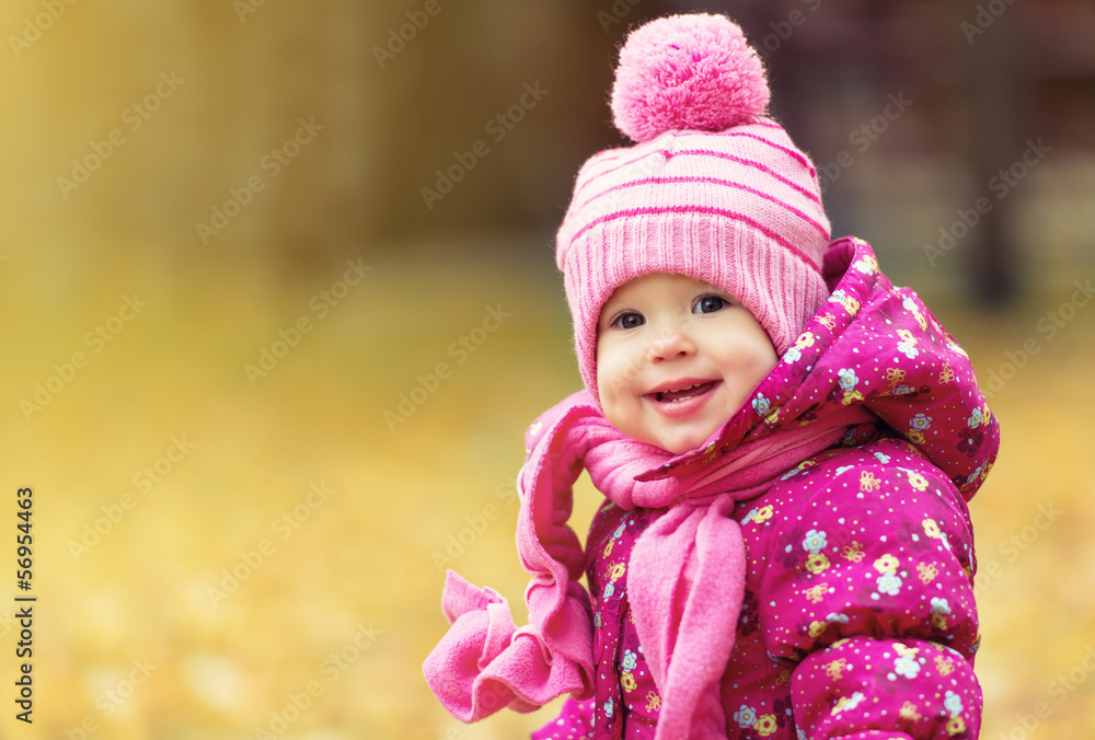happy baby girl child outdoors in the park in autumn happy baby girl child outdoors in the park in autumn
