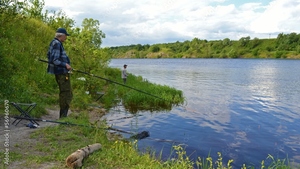 fishermen fishing on the river timelaps