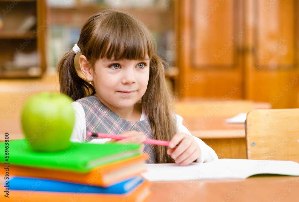 girl drawing in copybook in classroom girl drawing in copybook in classroom