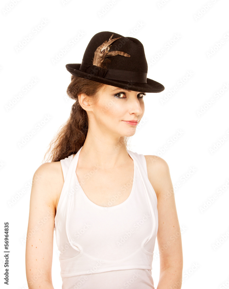 Pretty woman in hat with bird's feather Pretty woman in hat with bird's feather