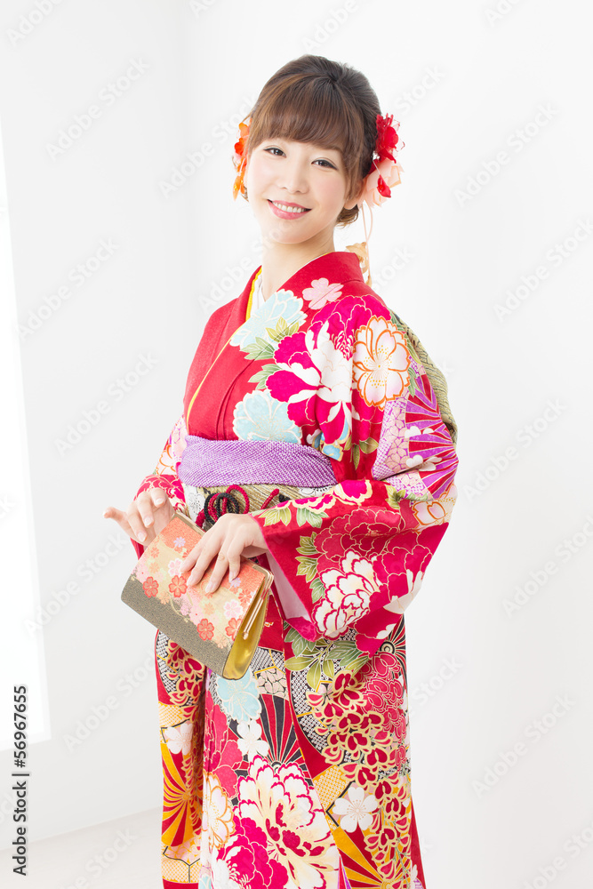 Beautiful asian kimono woman on white background Beautiful asian kimono woman on white background