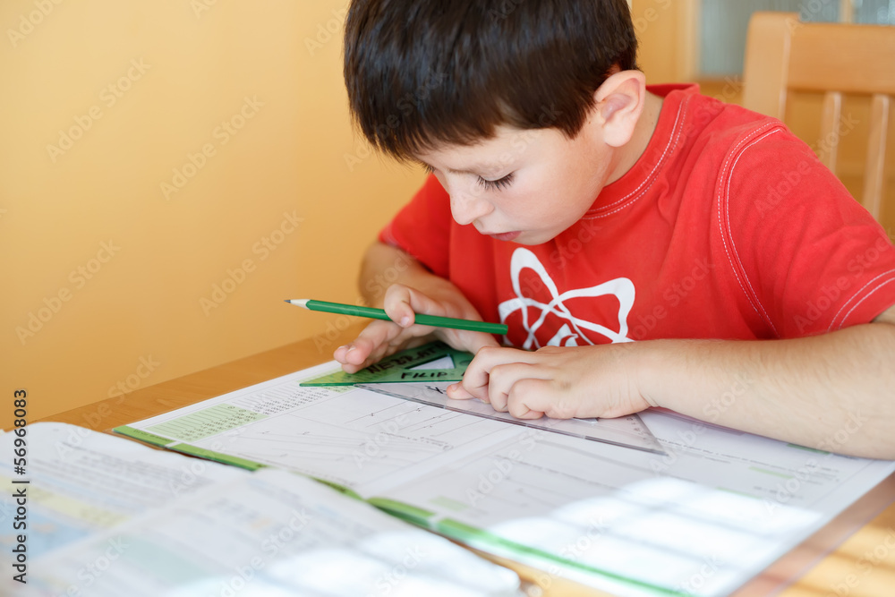boy doing school homework boy doing school homework