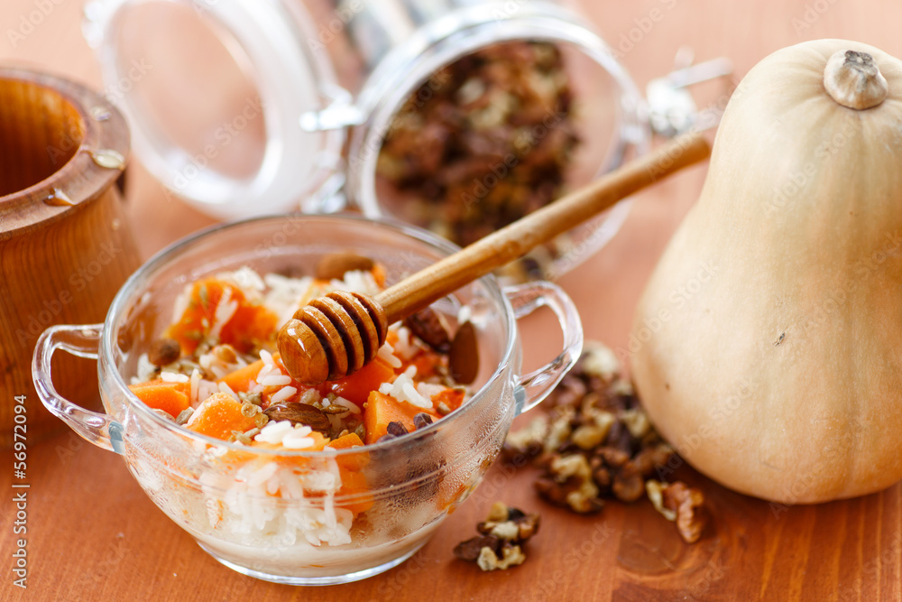 Fototapeta premium boiled rice with pumpkin and nuts