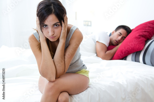 woman who can not sleep because her husband snores