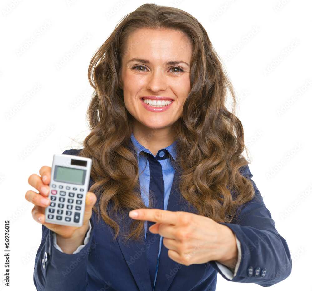 Smiling business woman pointing on calculator Smiling business woman pointing on calculator