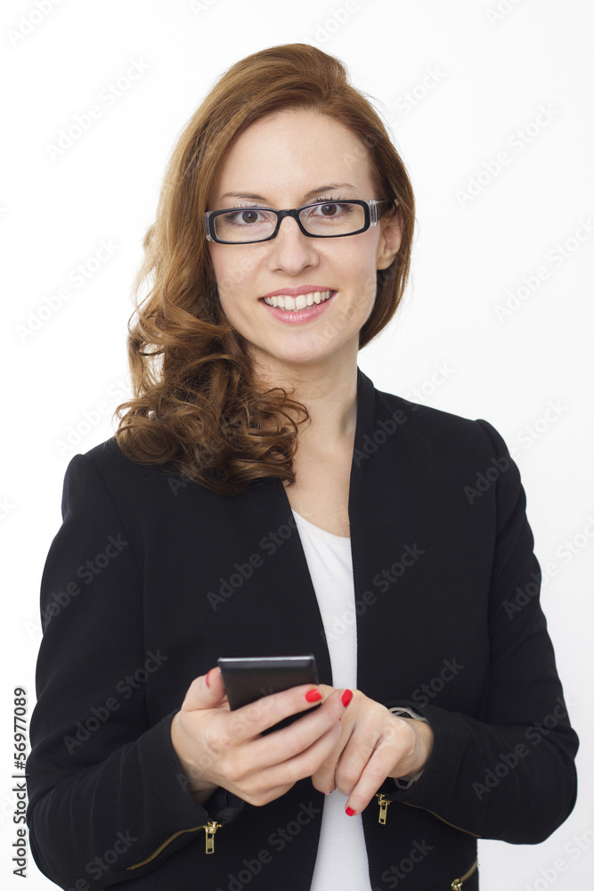 Cute smiling business female holding a cell phone Cute smiling business female holding a cell phone