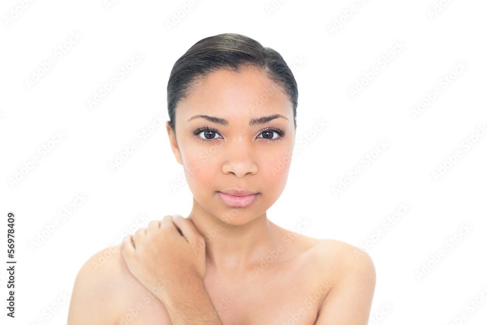 Stern young black haired model looking at camera Stern young black haired model looking at camera
