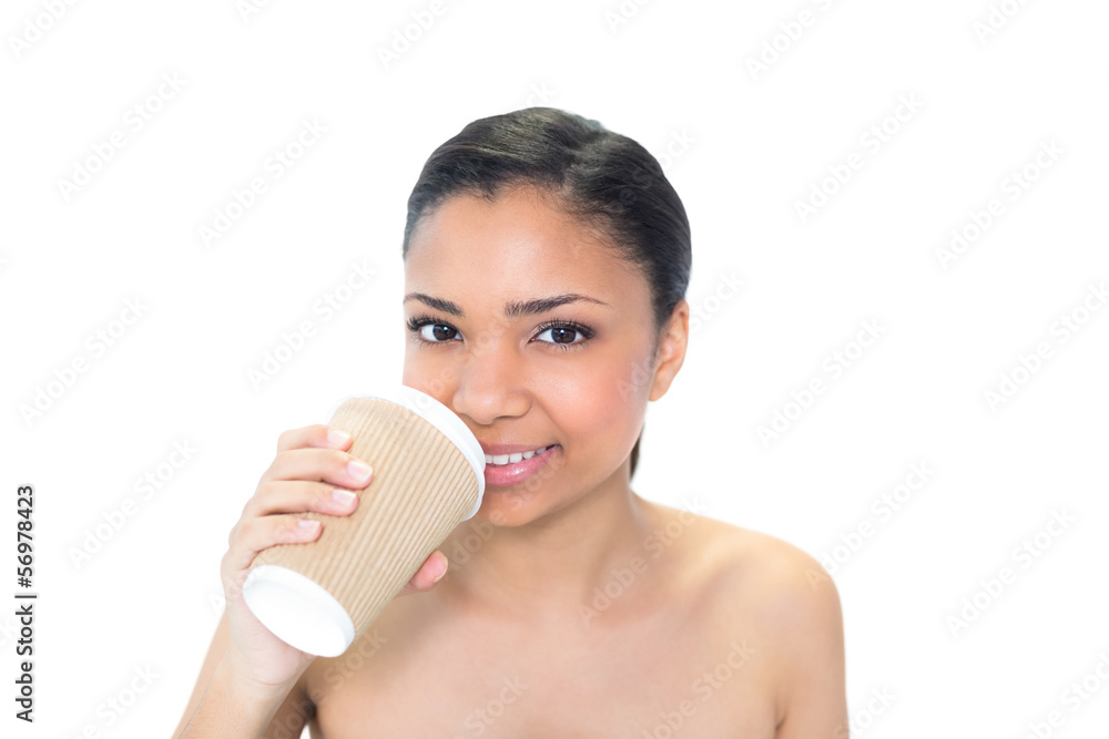 Cute young dark haired model drinking coffee Cute young dark haired model drinking coffee