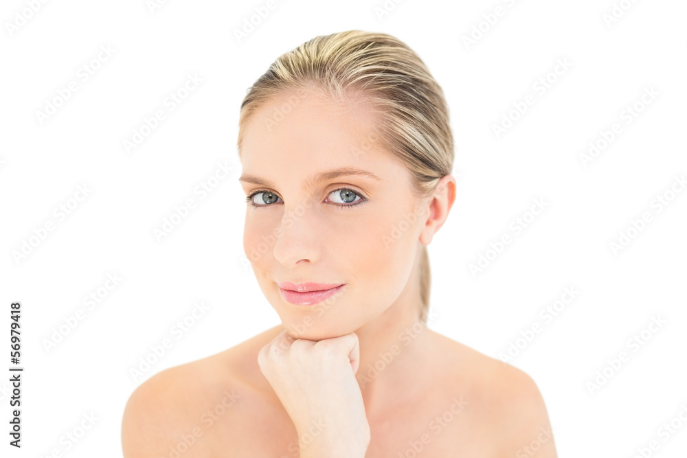 Peaceful fresh blonde woman holding her chin Peaceful fresh blonde woman holding her chin