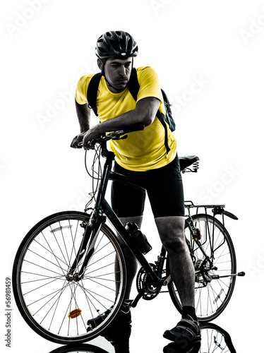 Fototapeta Naklejka Na Ścianę i Meble -  man bicycling  mountain bike tired breathless silhouette