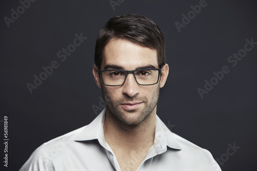 Portrait of mid adult man wearing glasses