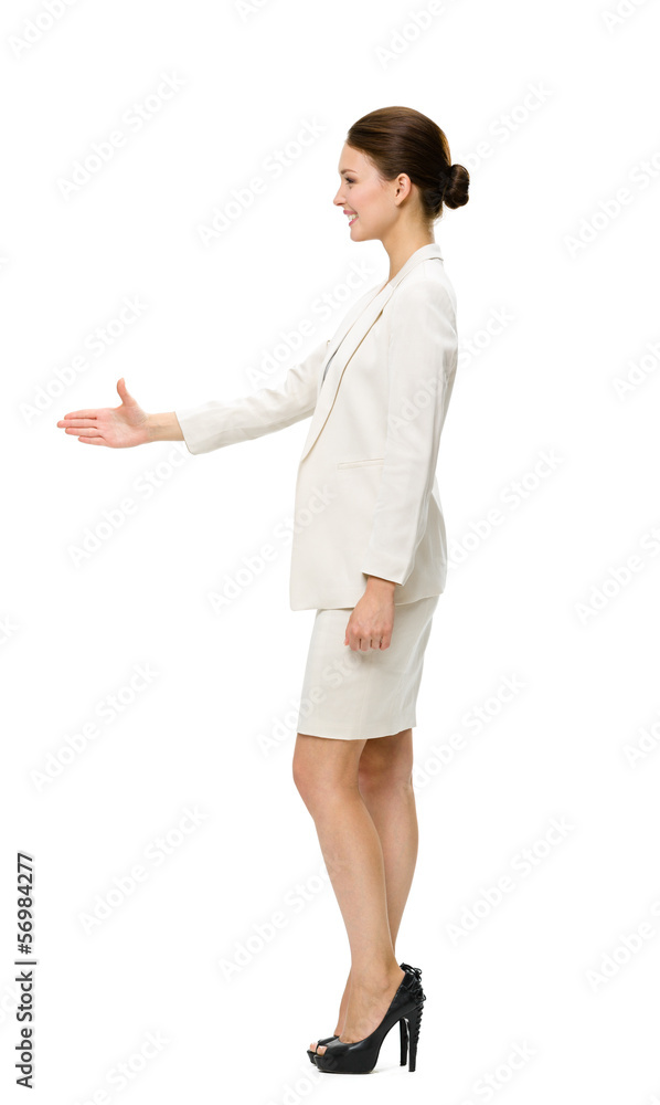 Full-length profile of business woman handshaking Full-length profile of business woman handshaking