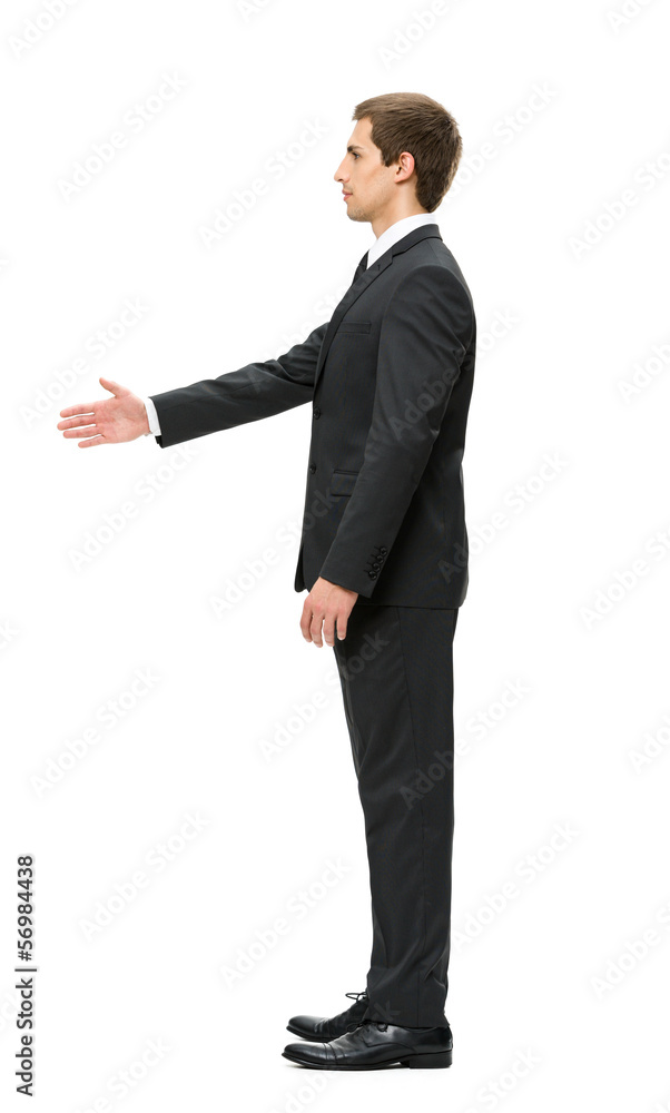 Profile of businessman handshake gesturing, isolated Profile of businessman handshake gesturing, isolated
