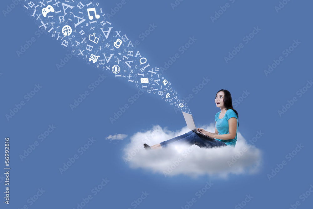 Female student with laptop and flying letters Female student with laptop and flying letters