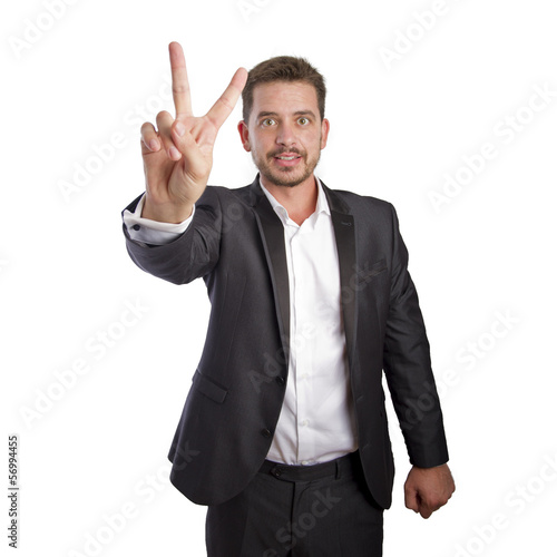 Business man doing the victory gesture