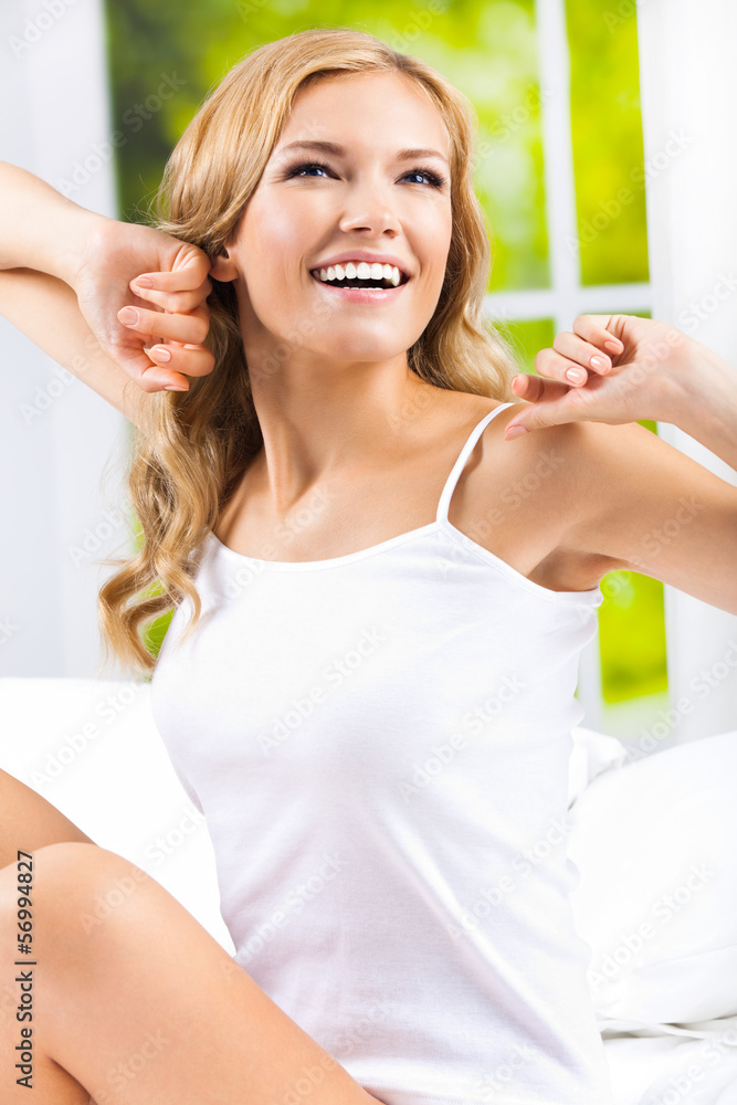 Young woman waking up, at bedroom Young woman waking up, at bedroom
