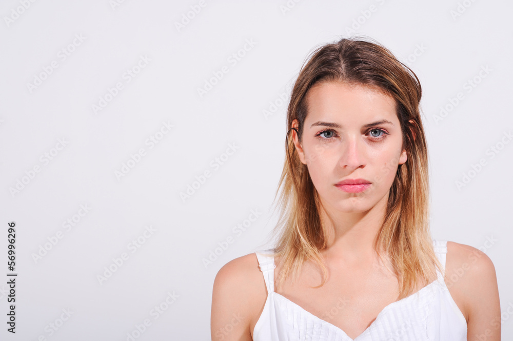Fototapeta premium Closeup of a young girl serious and angry