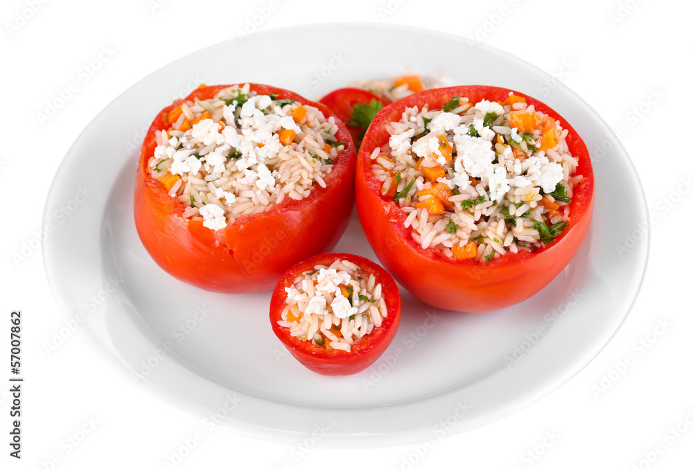 Stuffed tomatoes on plate isolated on white Stuffed tomatoes on plate isolated on white