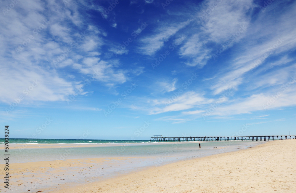 Beautiful blue sky over wide sandy beach