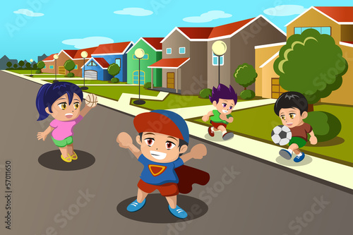 Kids playing in the street of a suburban neighborhood