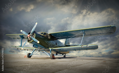 Fotografie, Obraz Retro style picture of the biplane. Transportation theme.