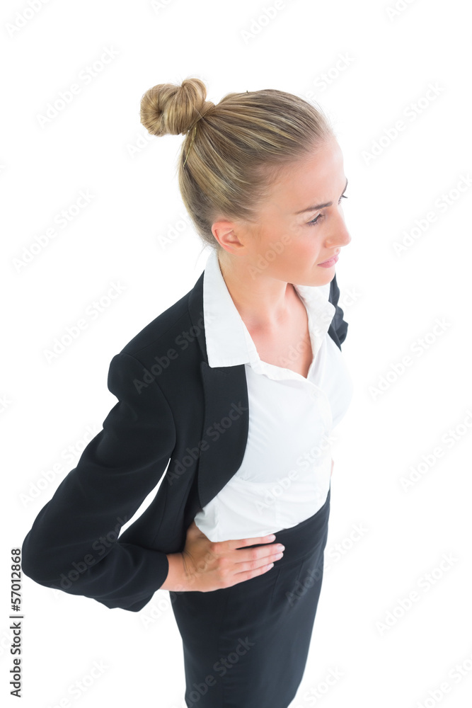 High angle side view of attractive young businesswoman posing High angle side view of attractive young businesswoman posing