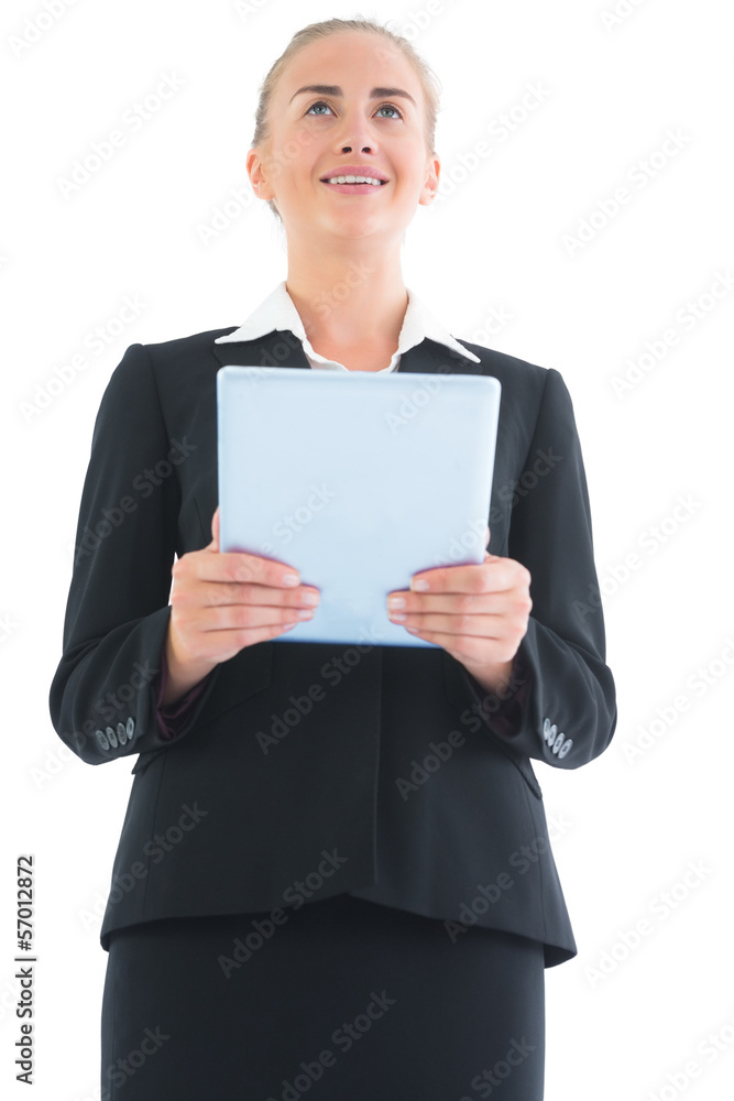 Low angle front view of beautiful young businesswoman holding he Low angle front view of beautiful young businesswoman holding he