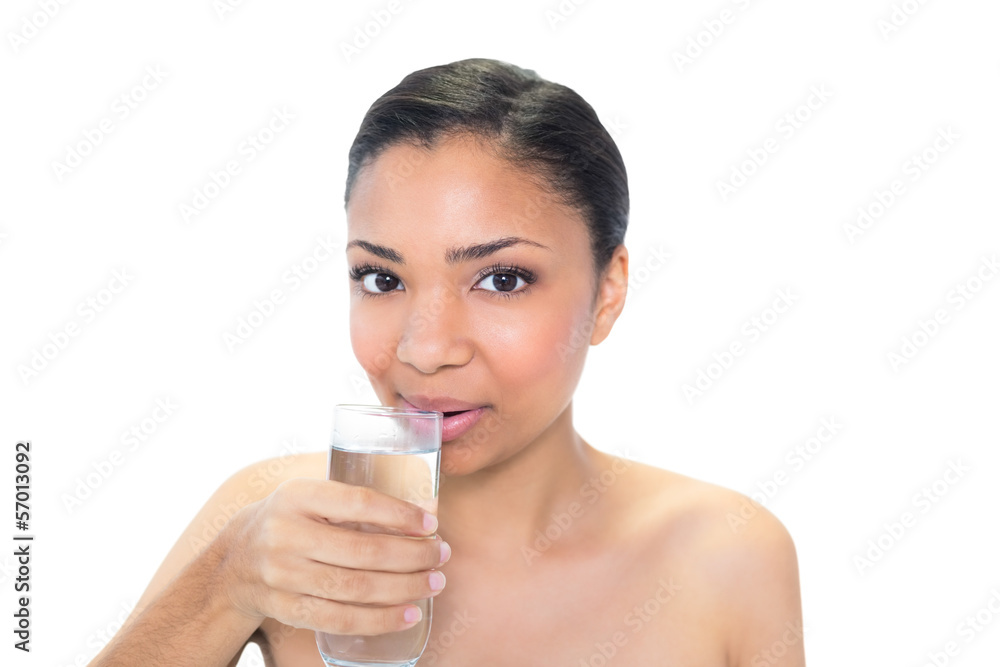 Lovely young dark haired model drinking water Lovely young dark haired model drinking water