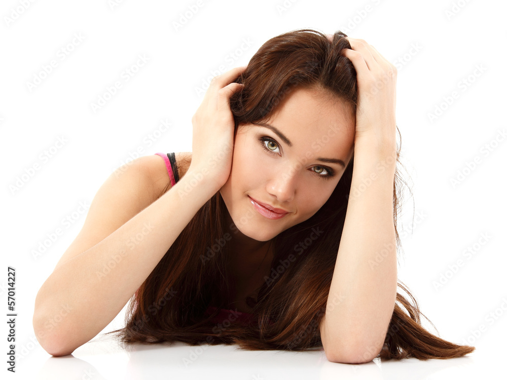 young woman beautiful cheerful lying and looking at camera isola young woman beautiful cheerful lying and looking at camera isola