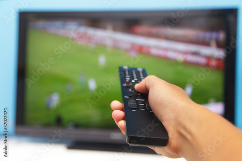 Hand pointing tv remote control