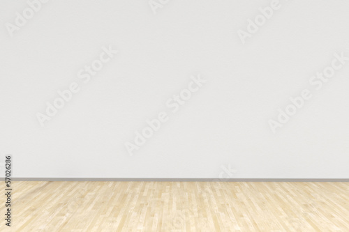 White room with hardwood floor