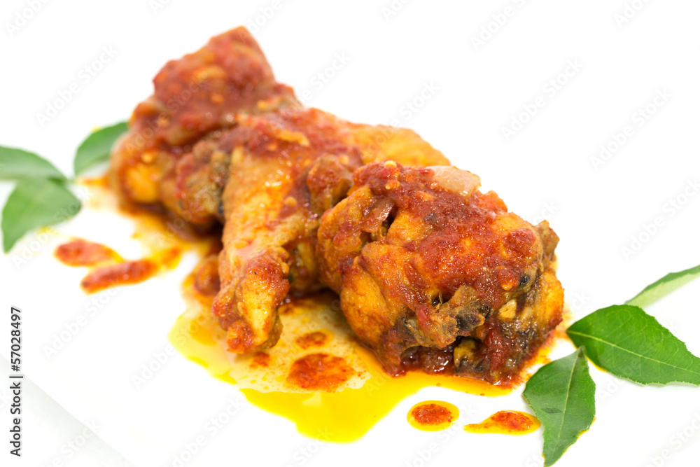 Sambal Ayam or Chicken with a chili-based sauce.