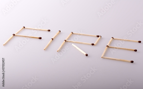 World "fire" written with matches