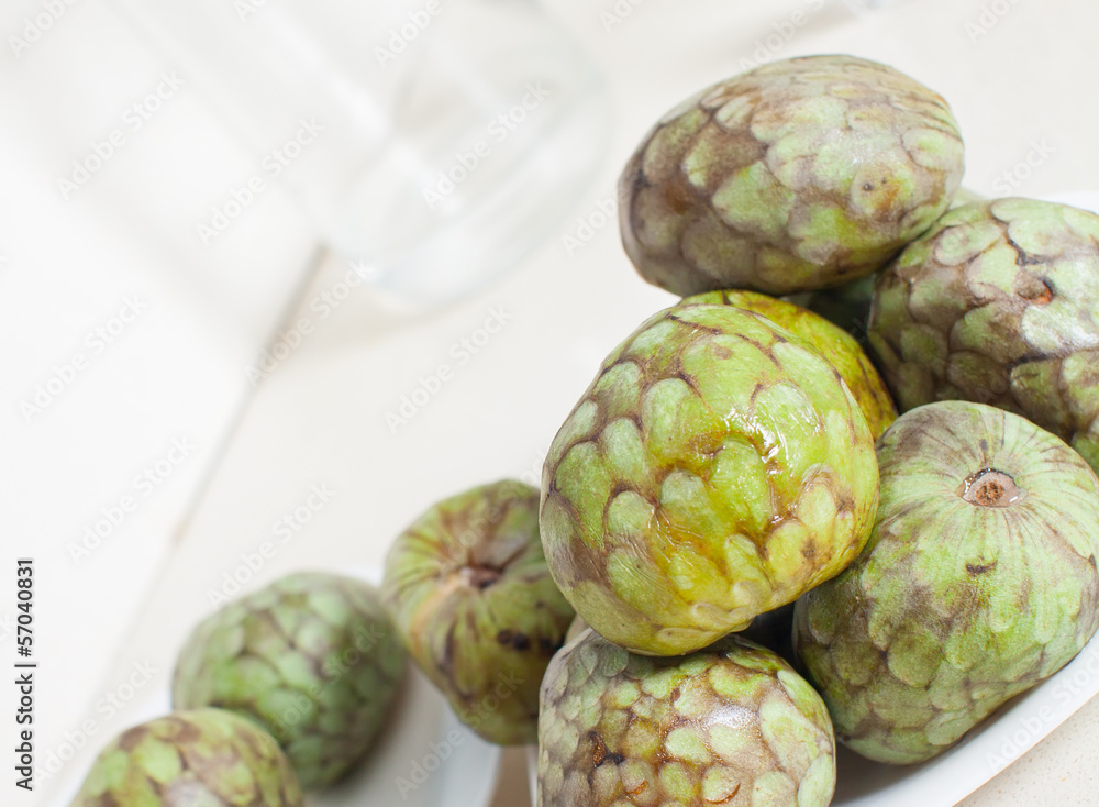 Fototapeta premium cherimoya on saucer