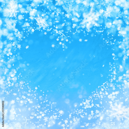 blue winter background with heart and snowflakes © artjazz