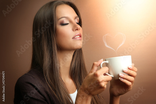 Beautiful young woman with ...