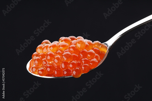 Red caviar on the spoon