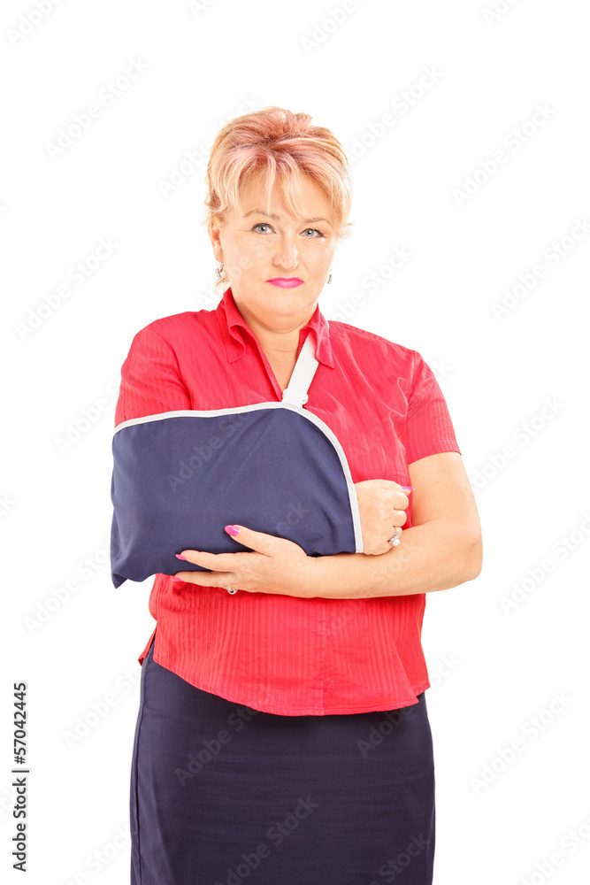 Injured mature woman with broken arm looking at camera Injured mature woman with broken arm looking at camera