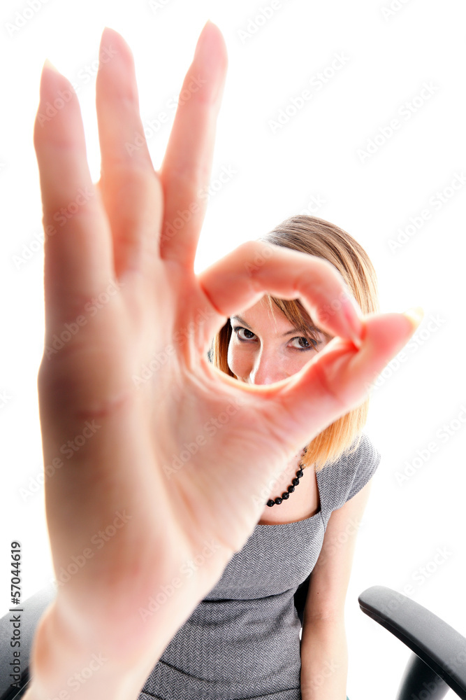 Fototapeta premium Business woman showing ok sign isolated