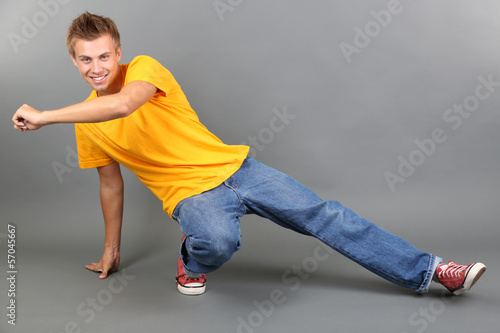 Handsome young man dancing ...