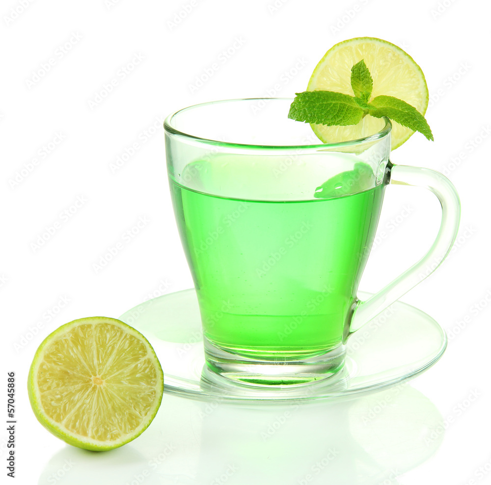 Fototapeta premium Transparent cup of green tea with mint and lime isolated