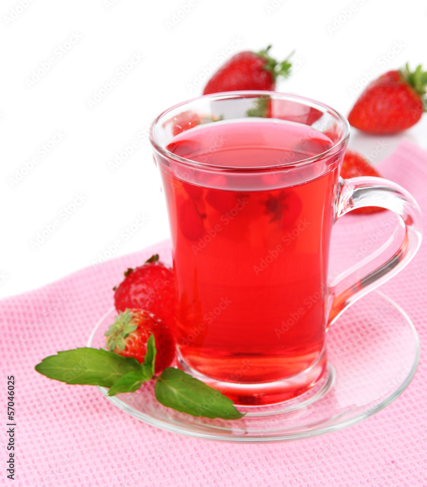 Delicious strawberry tea on table on white background Delicious strawberry tea on table on white background