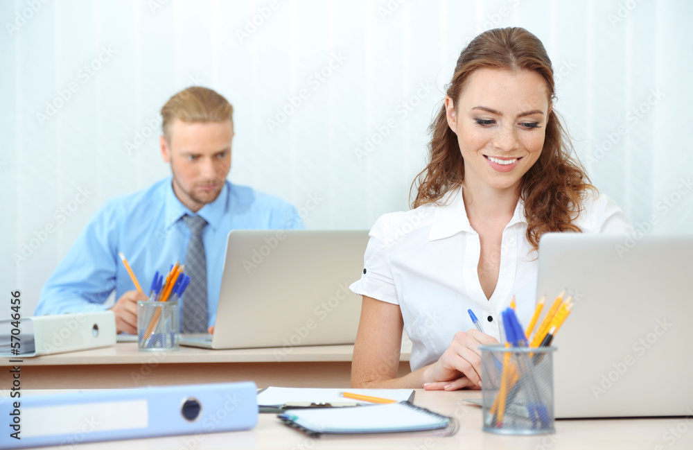 Office workers in workplace Office workers in workplace